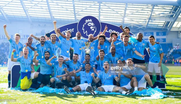 Manchester City pose with the Premier League trophy