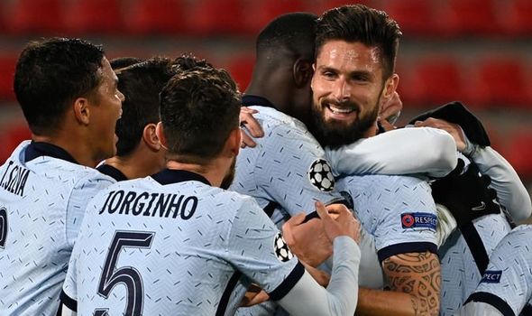 Olivier Giroud celebrates late goal against Rennes in UCL